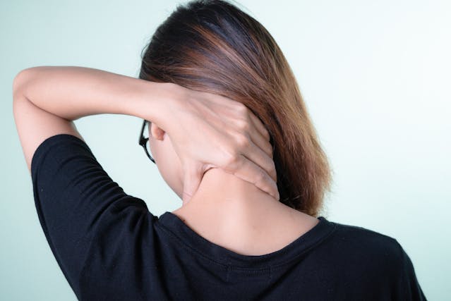 A women's neck-pain due to inflamation