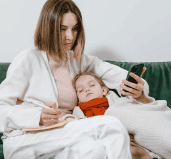 Exhausted mom juggling motherhood and wellness