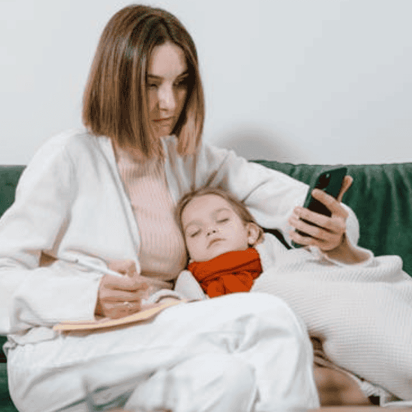 Exhausted mom juggling motherhood and wellness