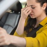 Woman Driving Having Headache